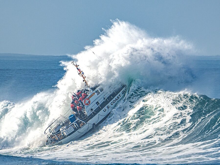 Photo: Motor lifeboat Victory heads into the breakers.