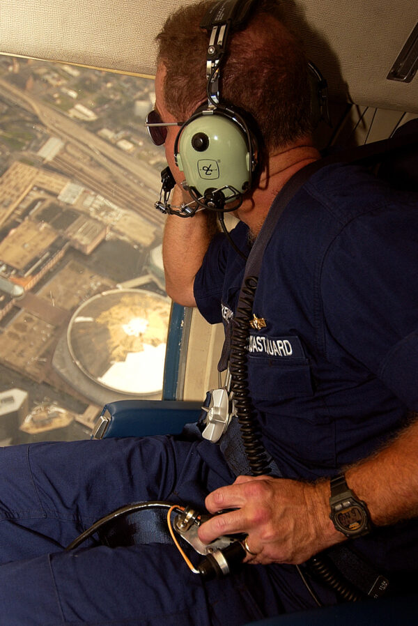 Photo: Capt. Frank Paskewich looks out over the ravaged Super Dome after Hurricane Katrina.