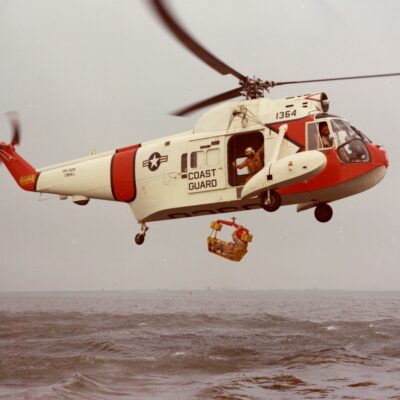Color photo of Coast Guard HH-52 “Seaguard” helicopter.