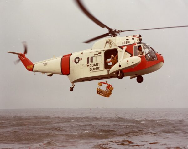 Color photo of Coast Guard HH-52 “Seaguard” helicopter.