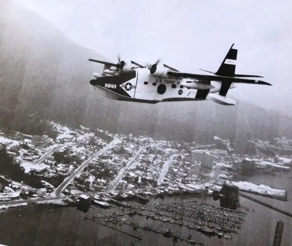 Photo: Aerial view of Albatross 2125 with coastal town below.