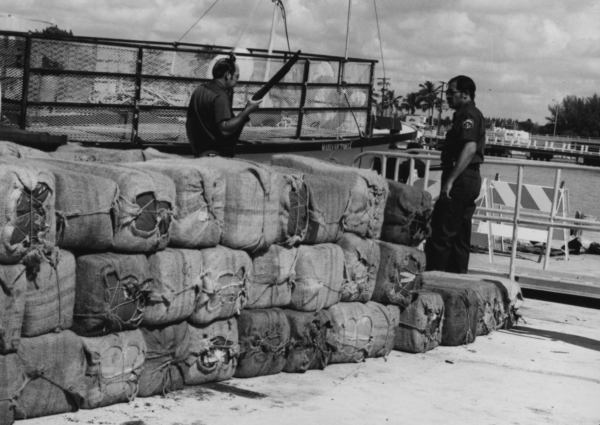 Offloaded Marijuana Bales under guard