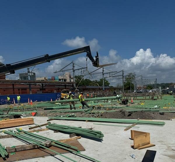 Photo: Large quantities of rebar are delivered to the worksite.