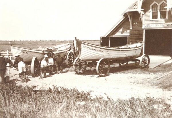 Photo: A lifesaving station with two boats on transport carts.