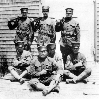 Photo: Coast Guard boat station crew posing in World War I uniforms