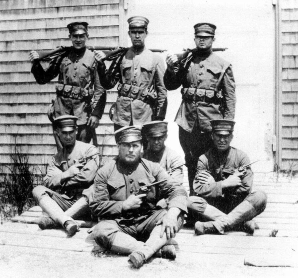 Photo: Coast Guard boat station crew posing in World War I uniforms