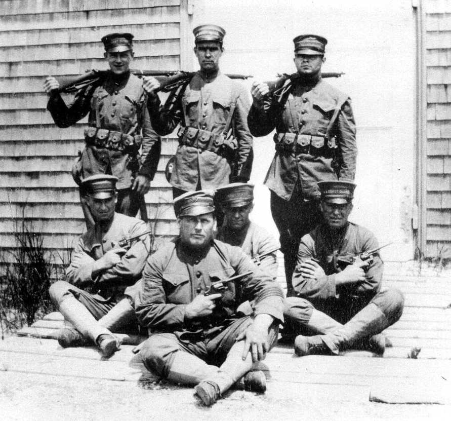 Photo: Coast Guard boat station crew posing in World War I uniforms