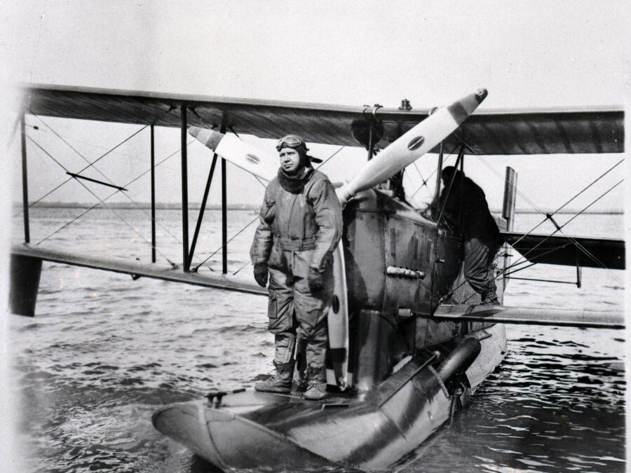 Photo: Charles Thrun stands on the center float of an OL-5.