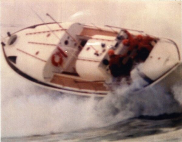 Photo: A 36-foot motor lifeboat surfing through breakers.