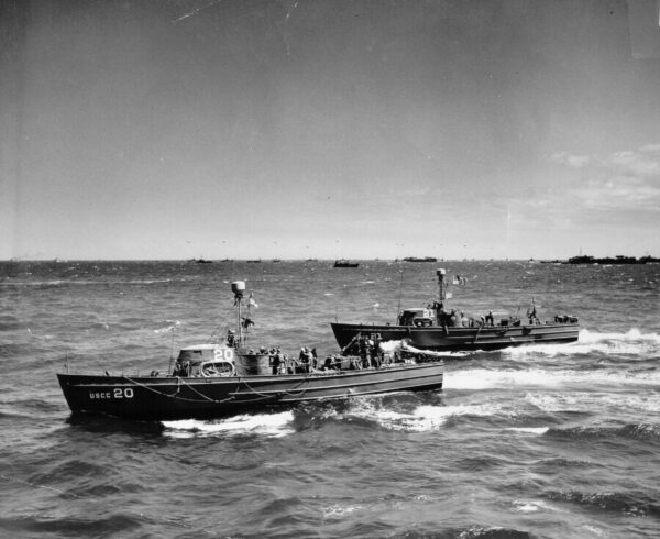 Photo: Two 83-foot cutters underway. Coast Guard 83-foot cutters CG-20 and CG-21 of the “Matchbox Fleet” underway on D-Day.