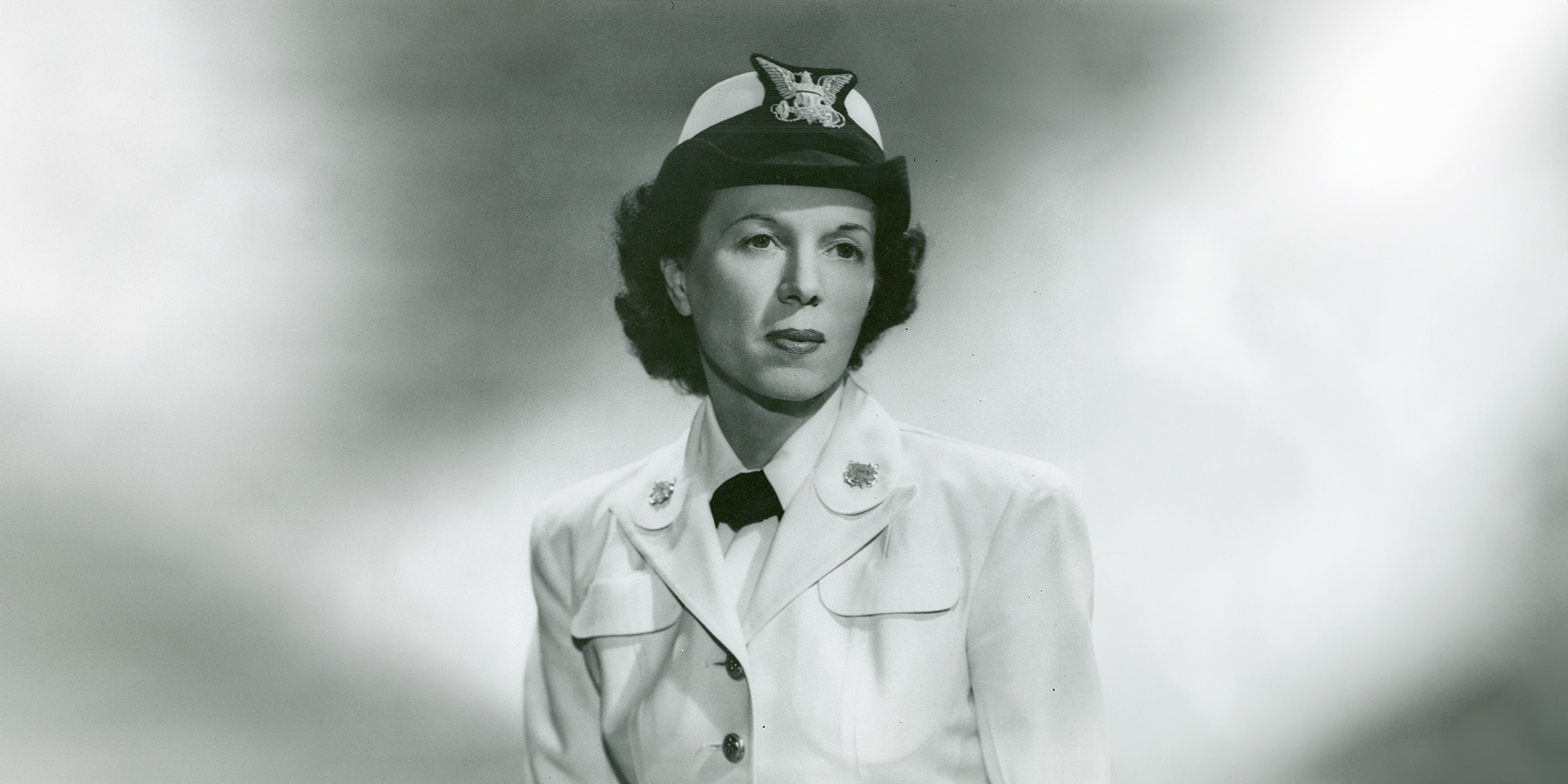 An official service photograph of Lt. Edith Munro in dress whites.
