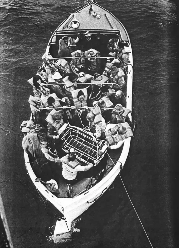 Photo: Lifeboat full of passengers as seen from above.