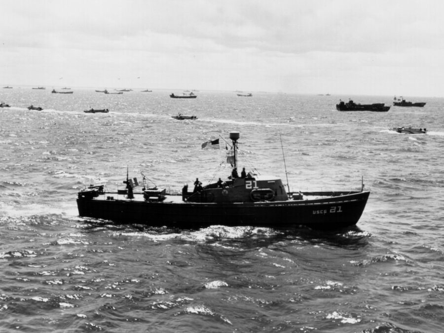 Photo: An 83-foot cutter in the foreground with many ships and other craft in the background.