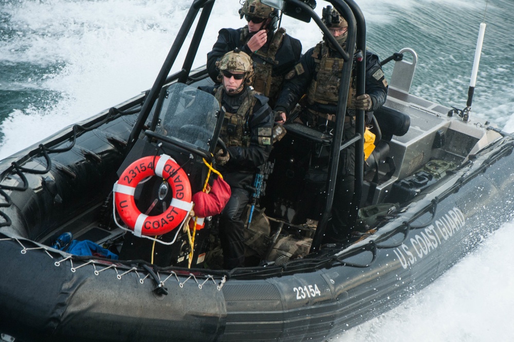 Photo: MSRT members deployed in a special rigid-hull inflatable patrol boat.
