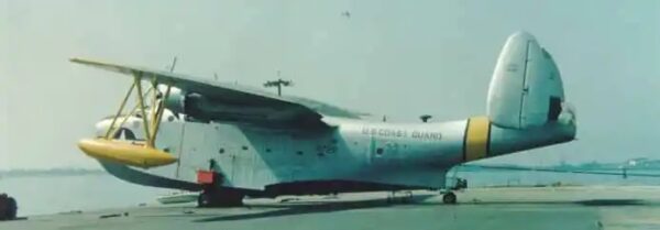 Photo: A large sea plane stationary on ramp.