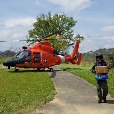 Photo: Supplies being delivered by helicopter.