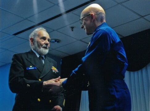 Photo: BMCM Poulin with Admiral Robert Papp.