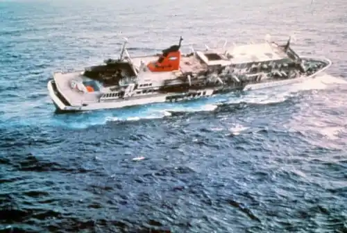 Photo: Prinsendam listing to starboard.