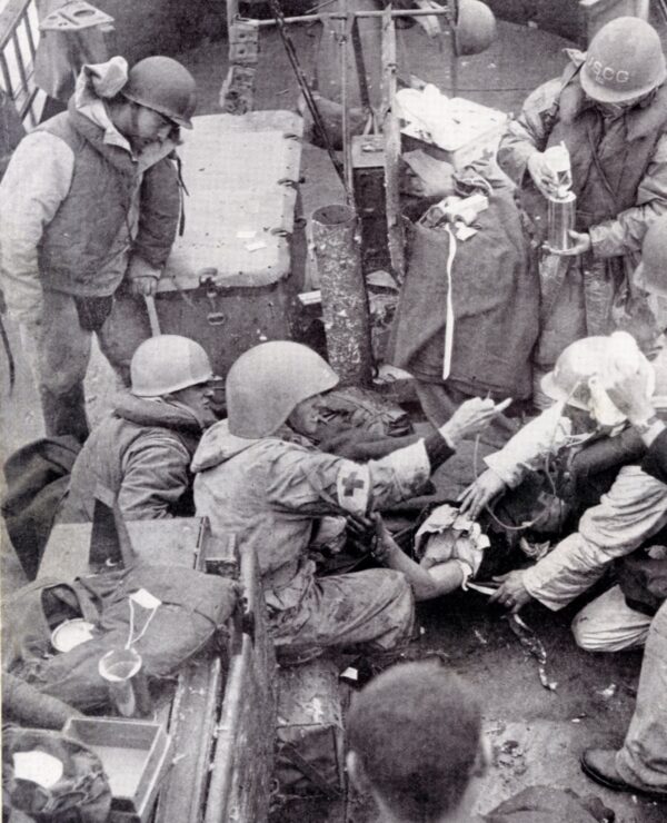 Photo: Medics huddle over Jack DeNunzio in his final moments.