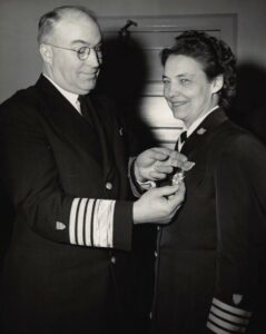 Photo: ADM Joseph Farley awards CAPT Stratton the Legion of Merit Medal.