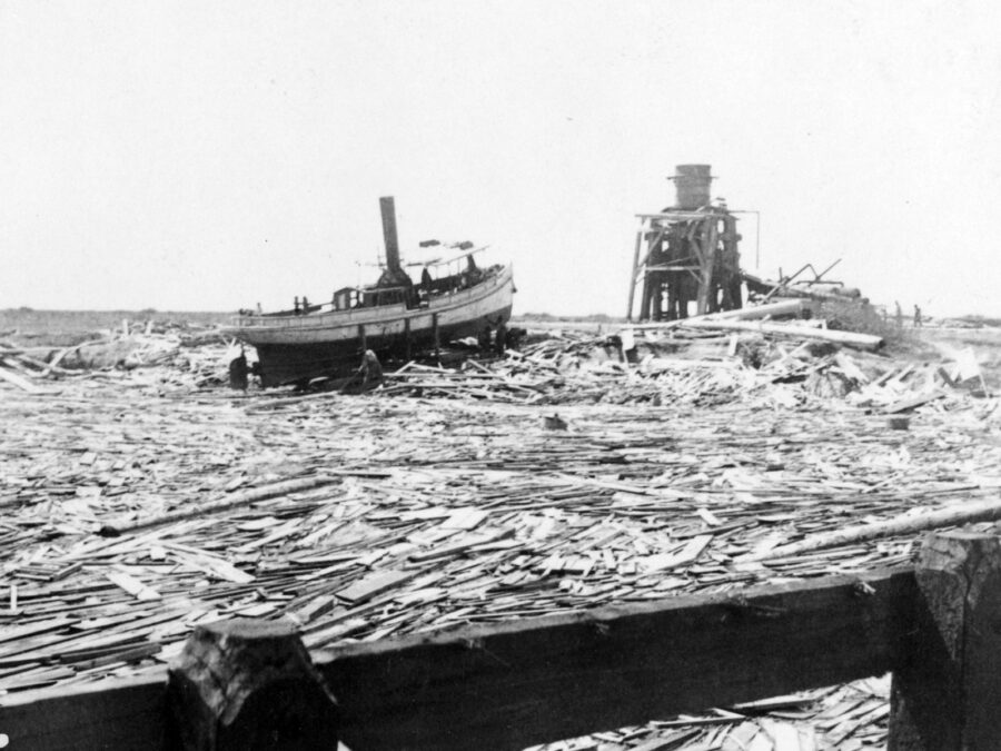 Photo: A lone steamboat sits in the midst of wreckage at Galveston waterfront.