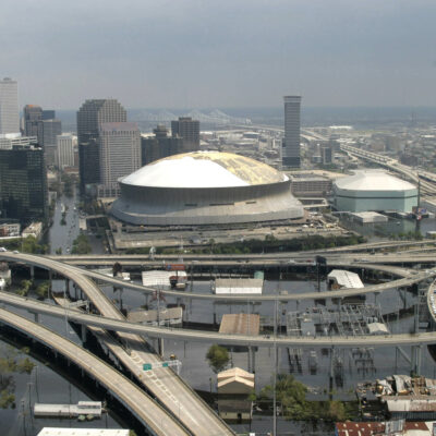 Photo: Aerial view of the Lousiana Superdome and nearby flooded areas.