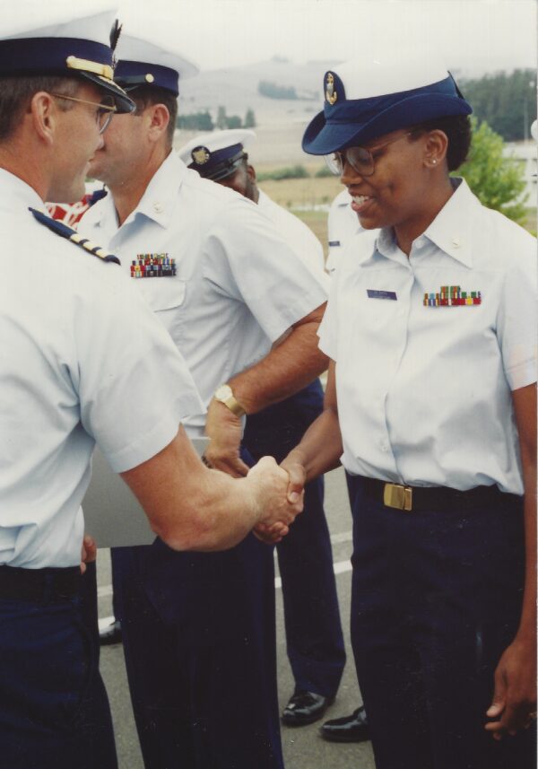 Photo: Chief McShan, yeoman, greeting an admiral.