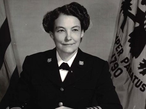 Photo: Dorothy C. Stratton at her desk.