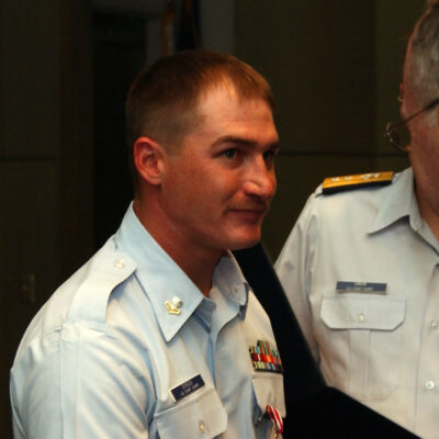 Photo: EM2 Rodney Gordon being decorated