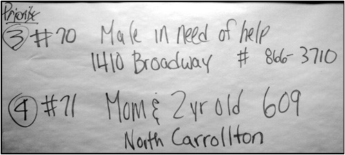 Photo: A makeshift task list: Priority 3 #70 - Male in need of help 1410 Broadway #866-3710; Priority 4 #71 Mom & 2 yr old 609 North Carrollton.