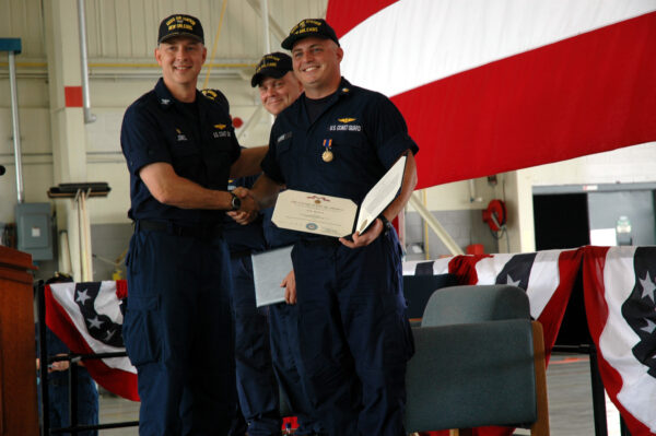 Photo: CAPT Bruce Jones presents the Air Medal to AET1 Galen Farris, Picture